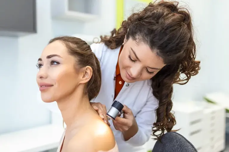 Cahaba Clinical Research - young woman getting shoulder examined